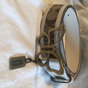 Coach Butterfly belt. White leather trim. Size M